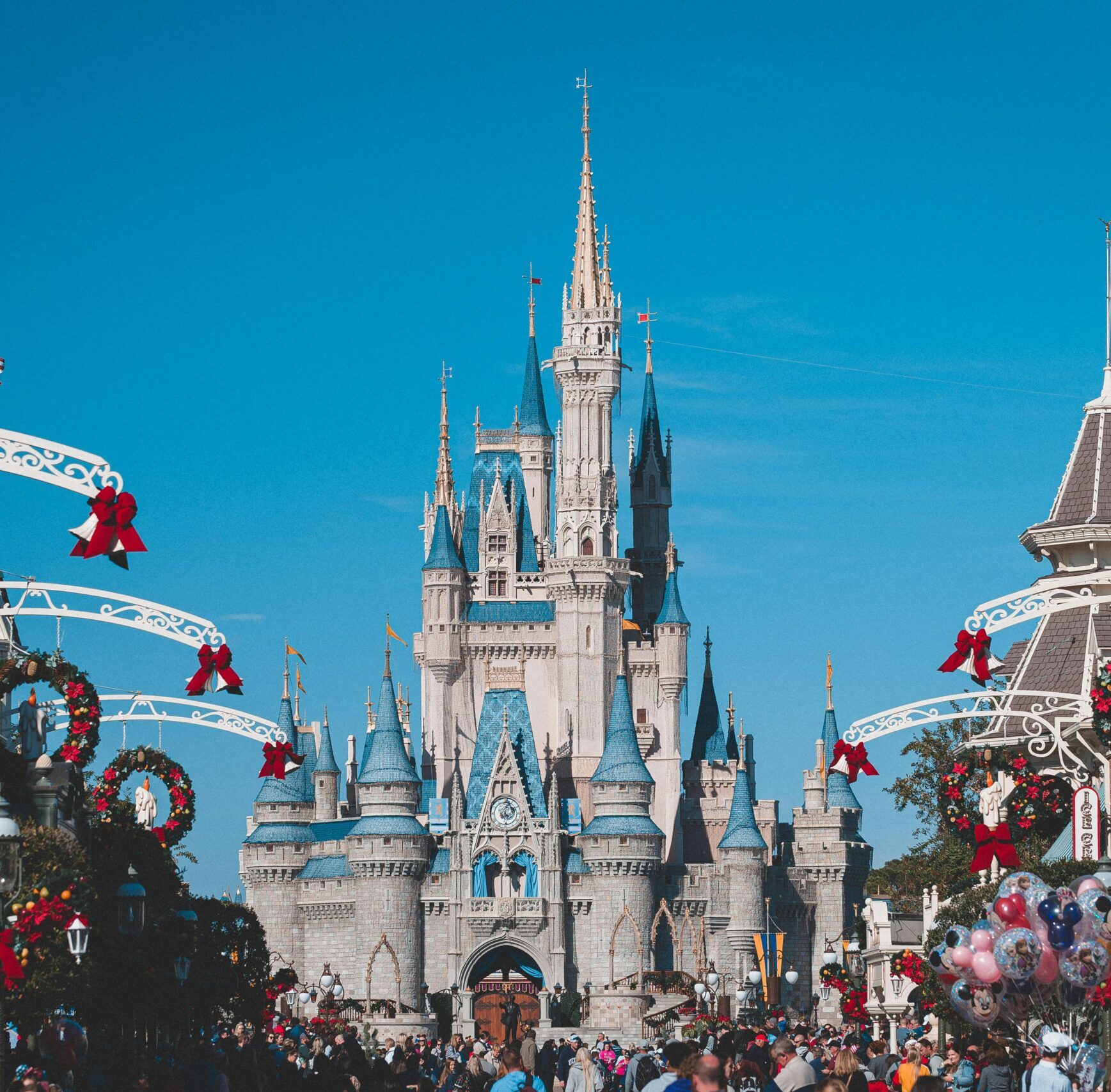 Cinderella Castle at Disney World's Magic Kingdom adorned for holiday festivities, Orlando, Florida.
